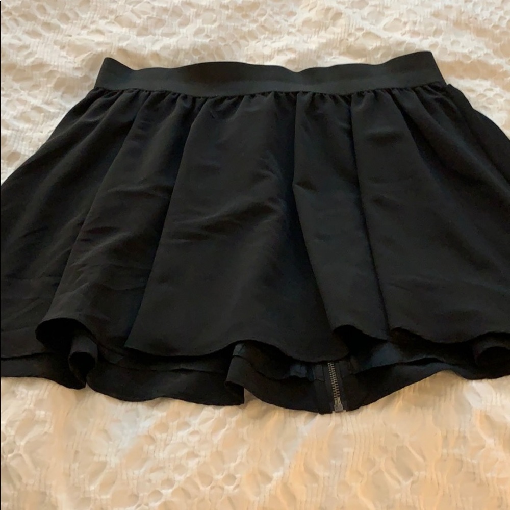 Short, flowy, basic black skirt